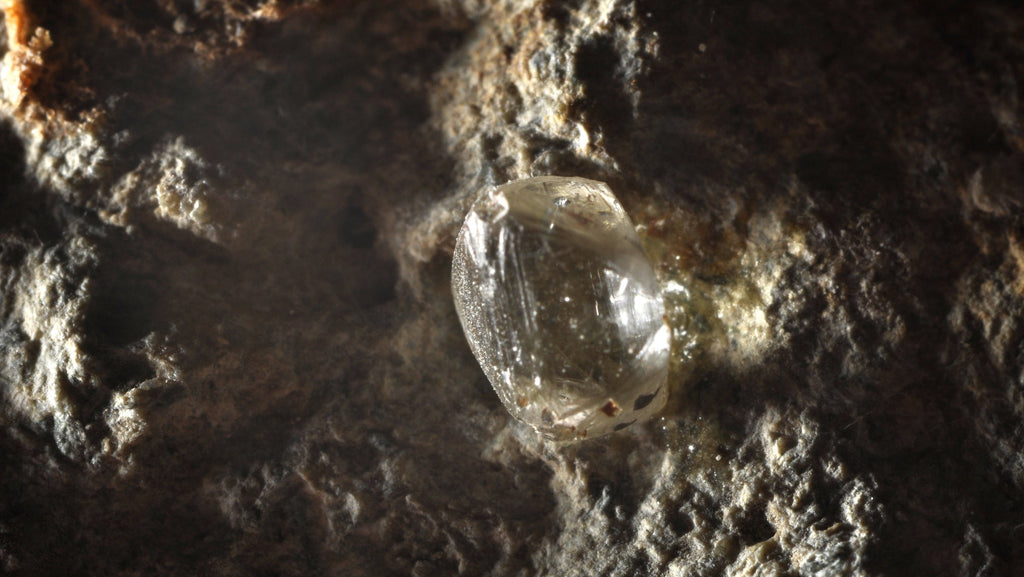 Diamond crystal used as the cover for a lab-grown versus natural diamonds comparison